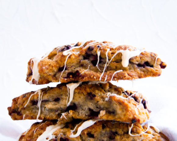 3 scones stacked on a plate in a close-up shot