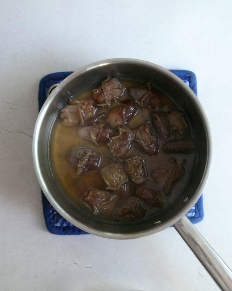 Cooked dates in a pot