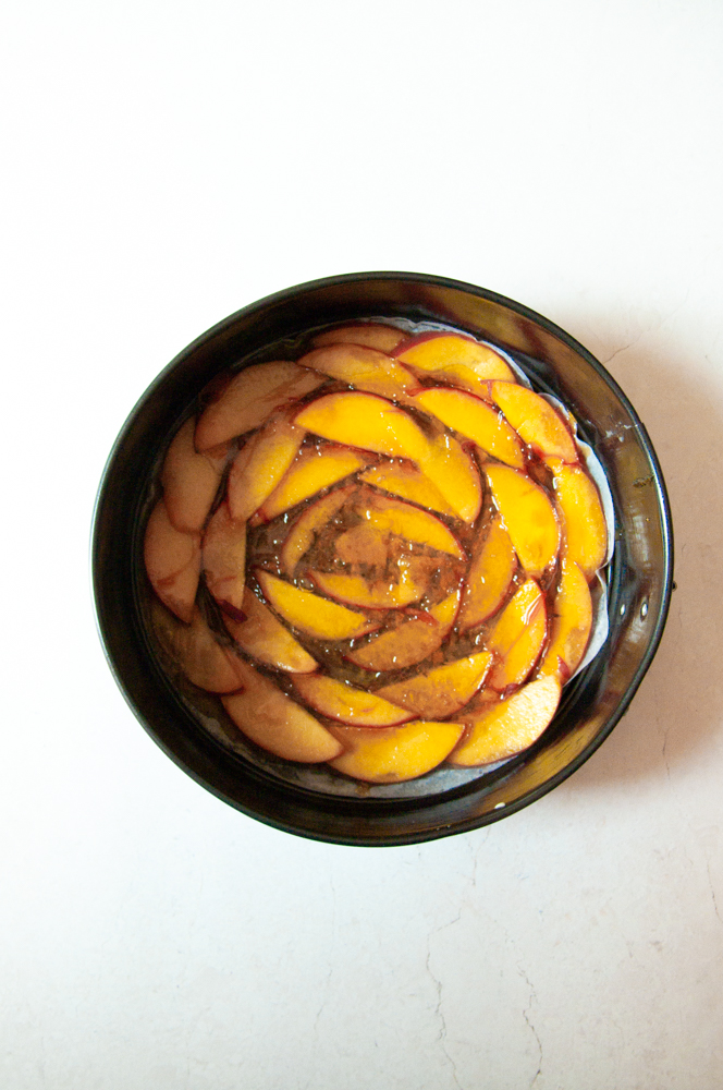 Sliced peaches and caramel in the cake (overhead shot)