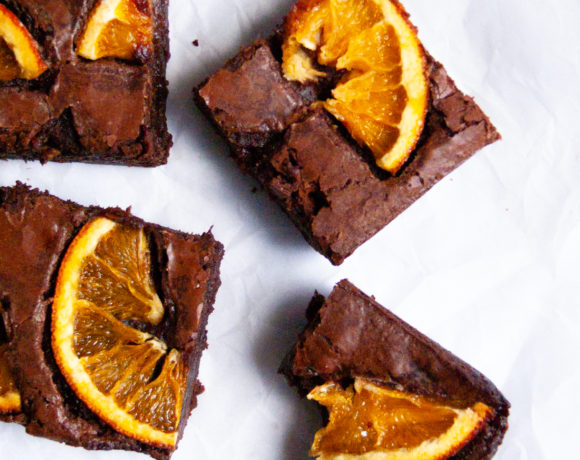 overhead shot of citrus brownies with slices dispersed